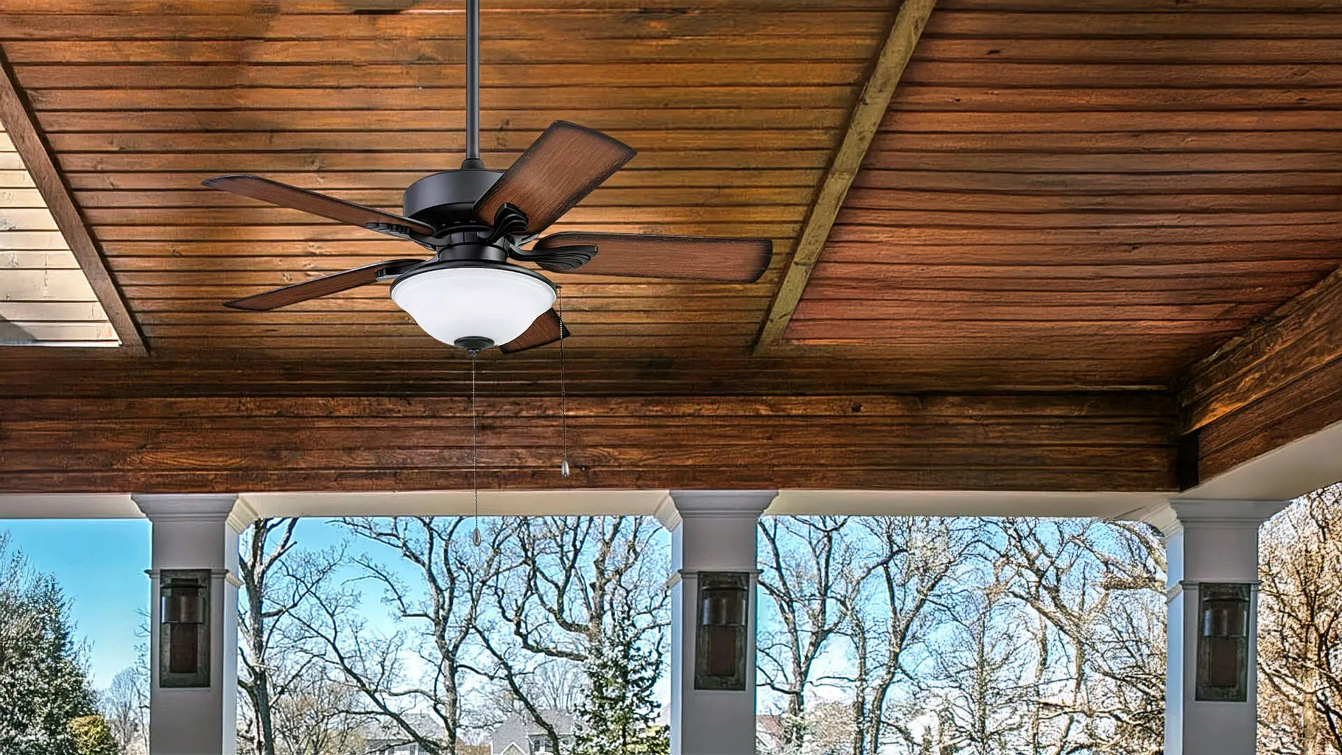 Electrician testing ceiling fan speeds after installation on the Gold Coast