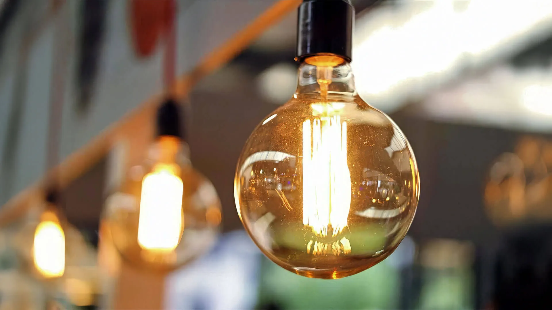 Electrician consulting with Gold Coast homeowner about lighting layout